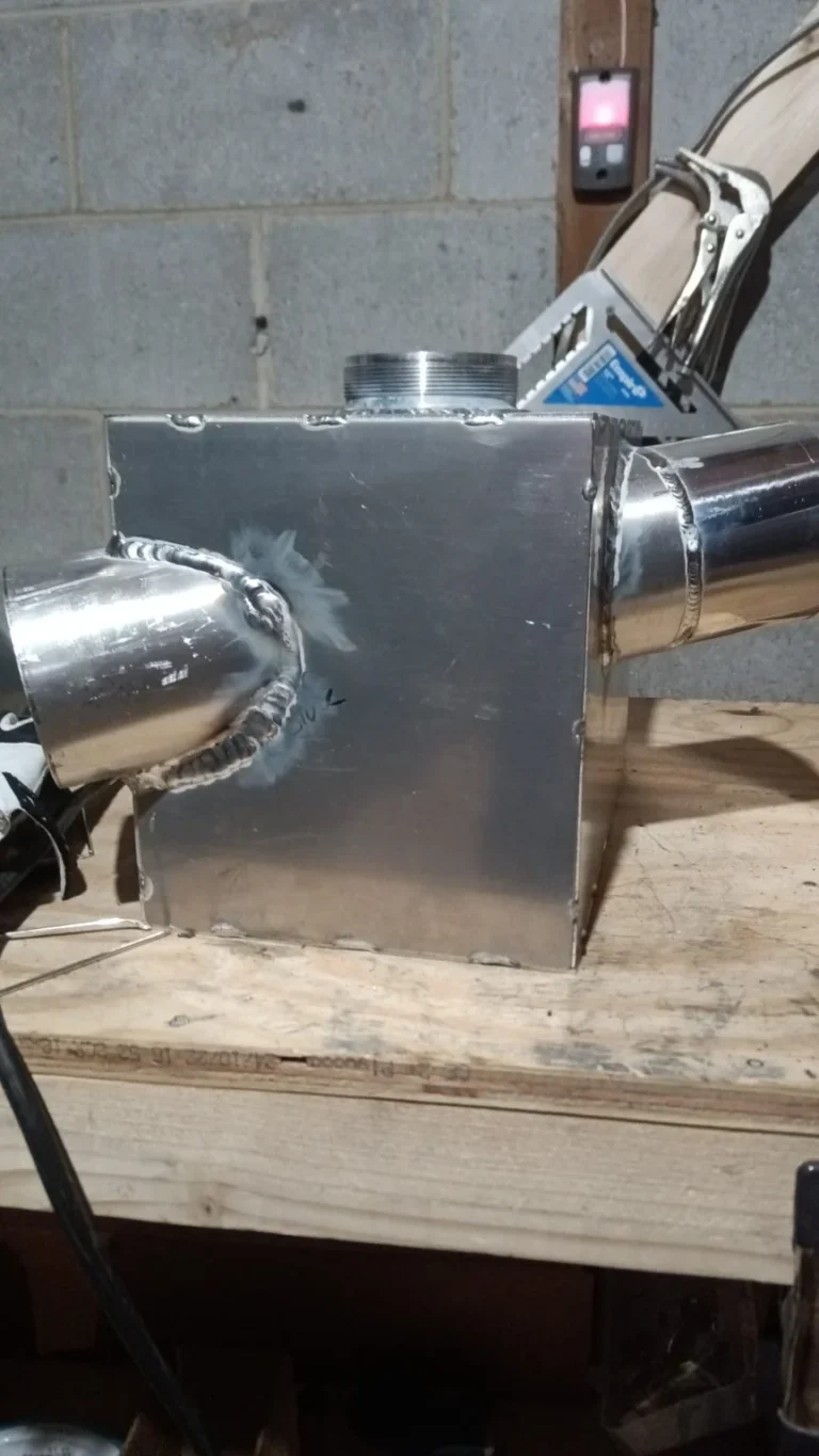 Fabricated box with pipe connections