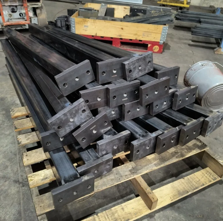 Batch of fabricated steel brackets and assemblies