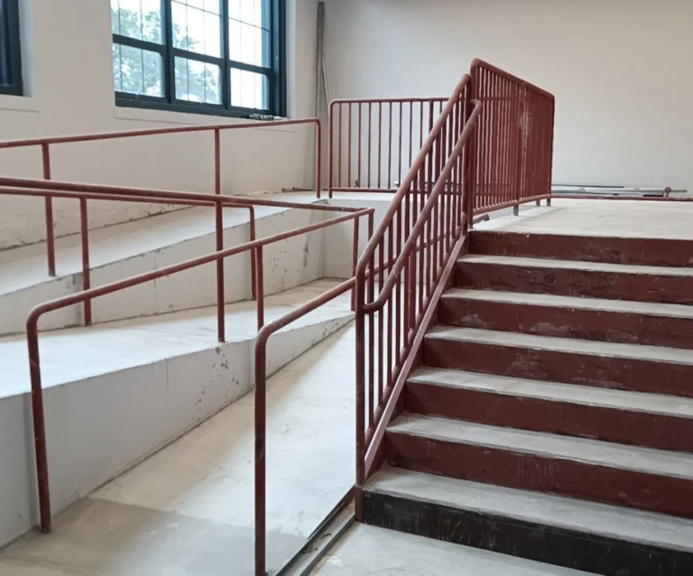 Painted steel stair handrails and landing railings